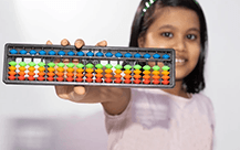 Child with abacus